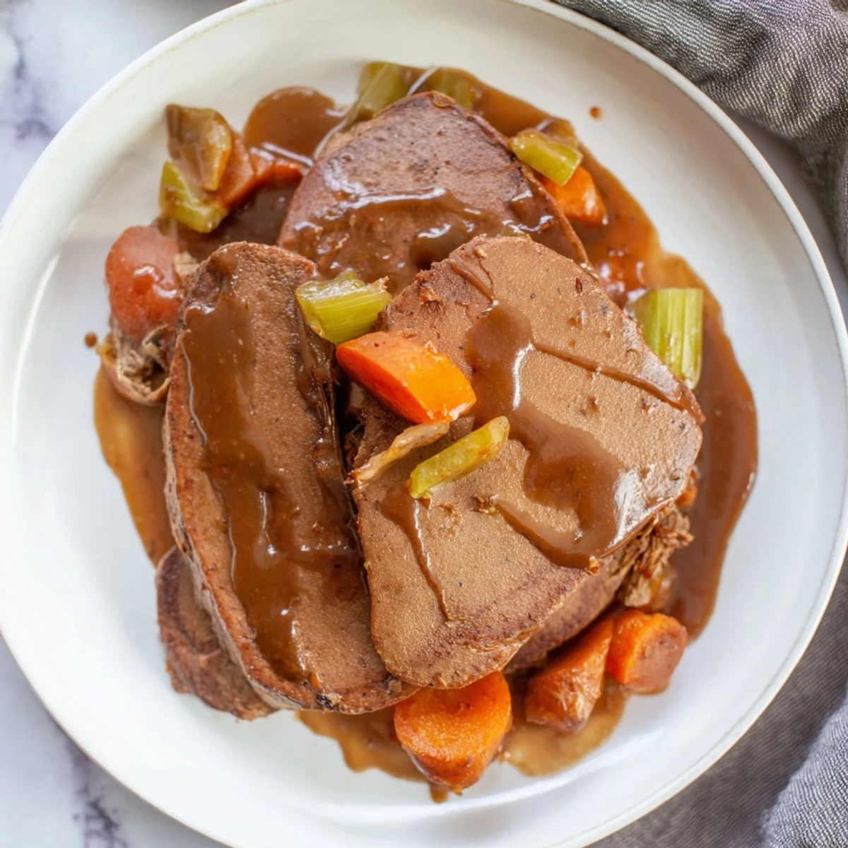 Tender Vegan Sauerbraten, seitan bathed in rich cranberry-balsamic marinade, ready to savor.