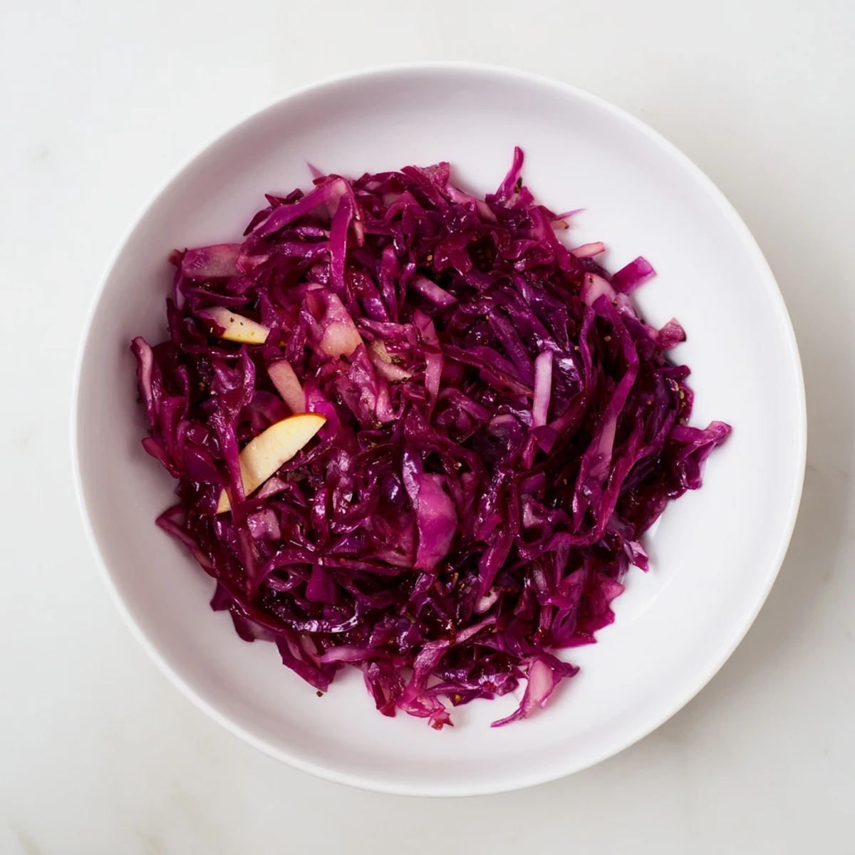 Tender Bavarian red cabbage and apple, a classic German side dish with a sweet and tangy flavor.