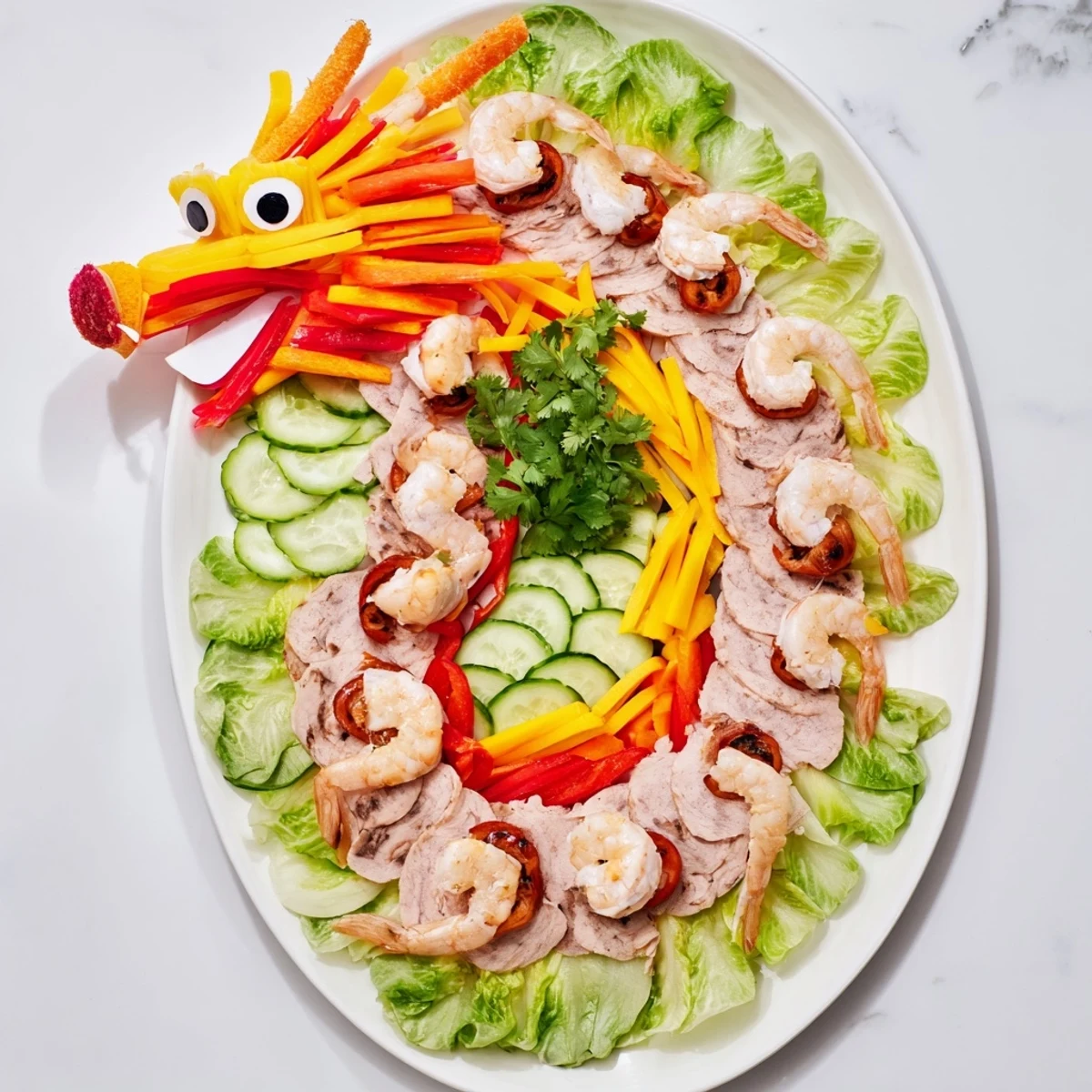 A beautifully arranged Lunar New Year dragon platter featuring colorful fruits, veggies, and potstickers.