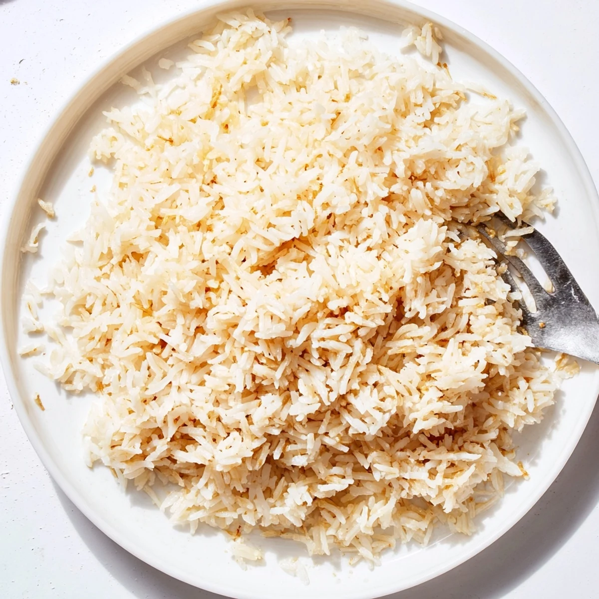 Steaming coconut jasmine rice with a delicate sweetness, ideal alongside your favorite curry dish.