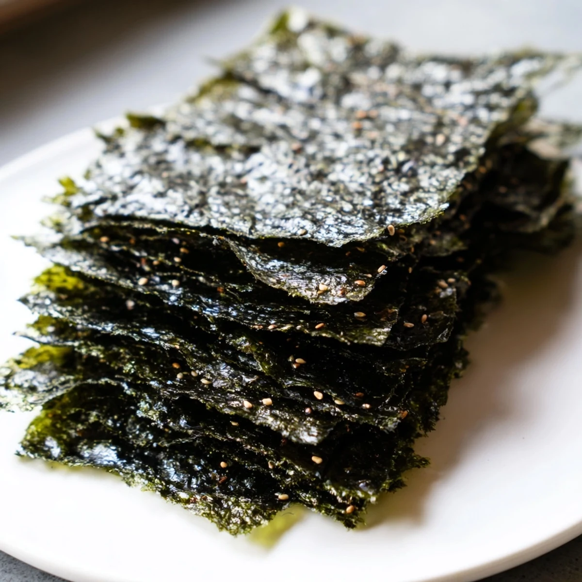 Close-up of freshly roasted, golden-brown Roasted Seaweed Chips, perfect for a healthy snack.