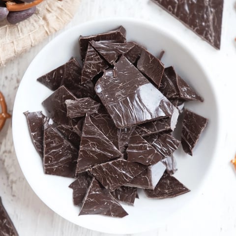 Delicious Spiderweb Candy Platter, a spooky Halloween treat with gummy spiders and colorful candies.