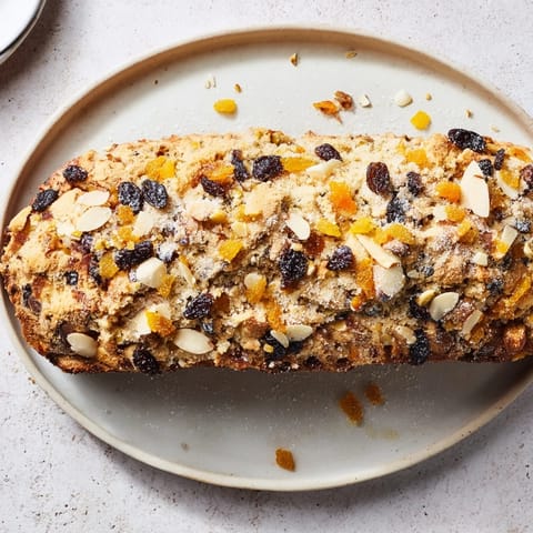 Close-up of freshly baked Quick Stollen Crunch Topping, showcasing golden crumbs and festive spices.