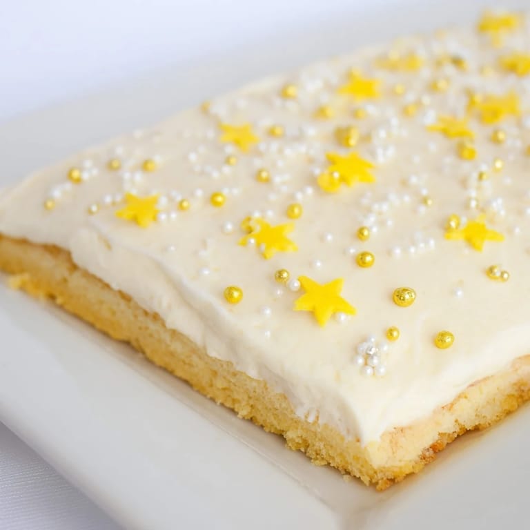 Buttery shortbread base holds the creamy vanilla frosting and star sprinkles of these Twinkle Twinkle Dessert Bars.