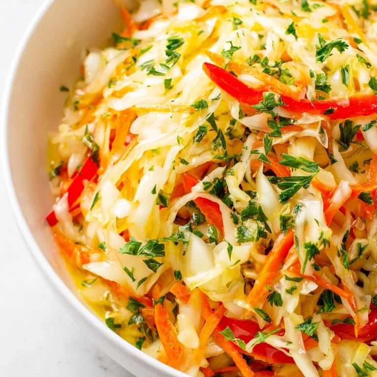 Vibrant Sauerkraut Slaw with crunchy green onions and tangy apple cider vinegar dressing, ready to enjoy.